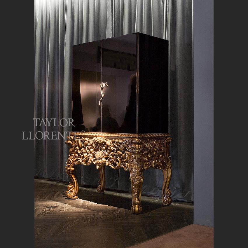 bar cabinet with baroque carved legs in gold leaf