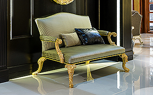 EXTRAVAGANTLY CARVED GILT THRONE SOFA