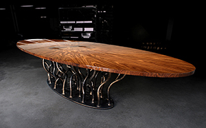 SCULPTURAL DINING TABLE WITH BURR WALNUT