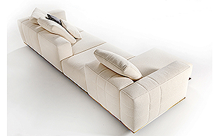 MODULAR SOFA SEATING WITH BRONZE METAL SEAT RAIL