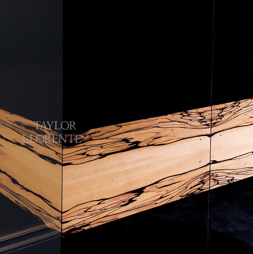 Detail of white macassar ebony and black lacquer sideboard. 