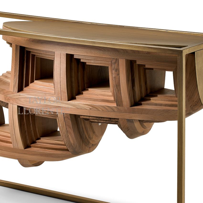 detail of architectural walnut wood console table with gold metal linear frame