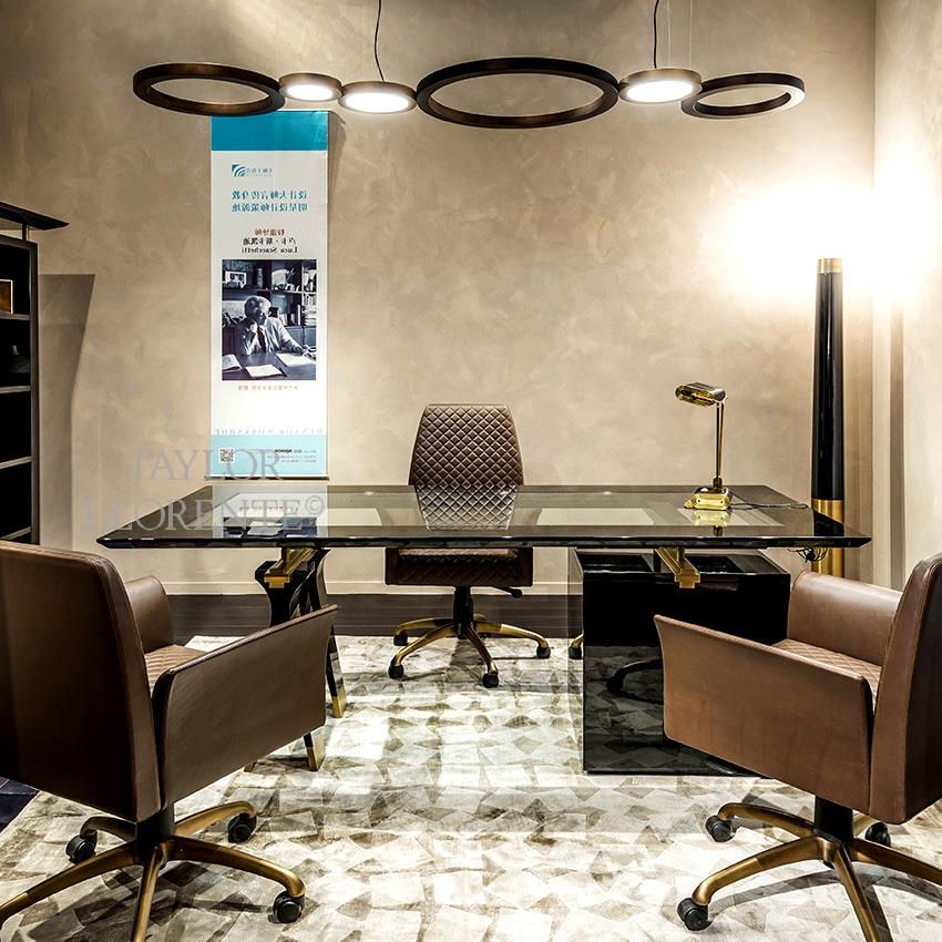 Black lacquered high end office desk with brass detailed desk frame.
